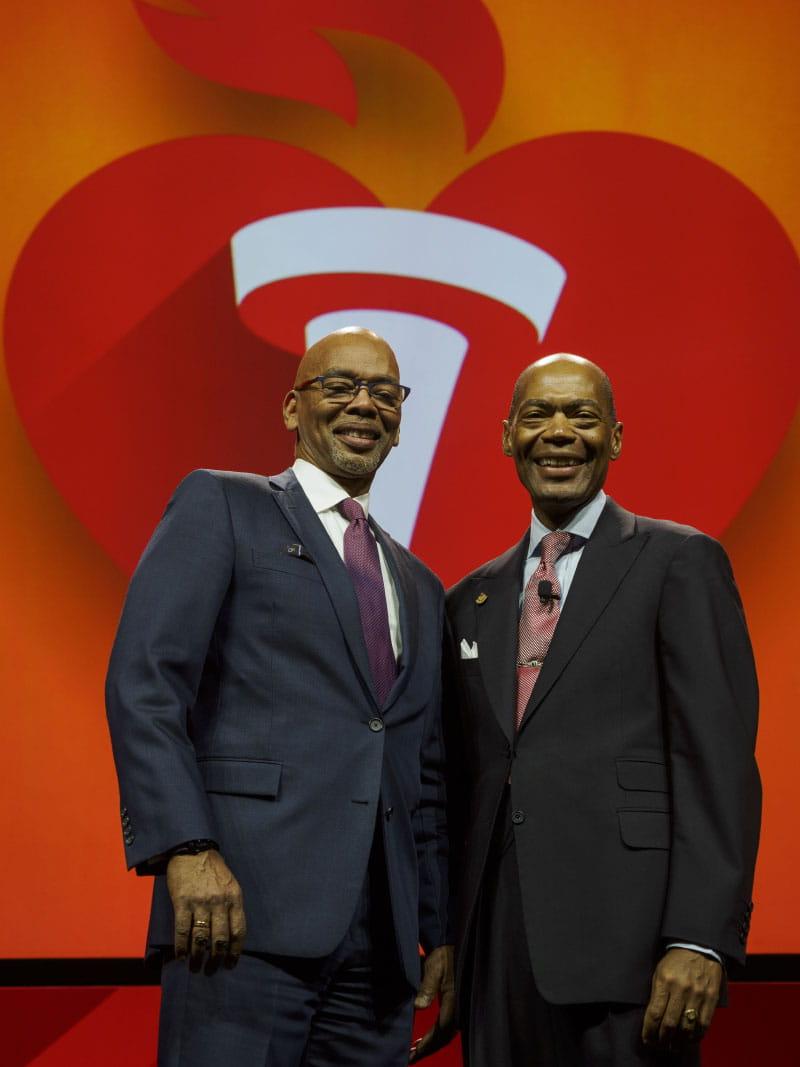 American Heart Association president Dr. Keith Churchwell presents Dr. Herman Taylor Jr. (right) with the AHA's Clinical Research Prize at its Scientific Sessions conference in Chicago in November 2024. (Photo by American Heart Association/Todd Buchanan)